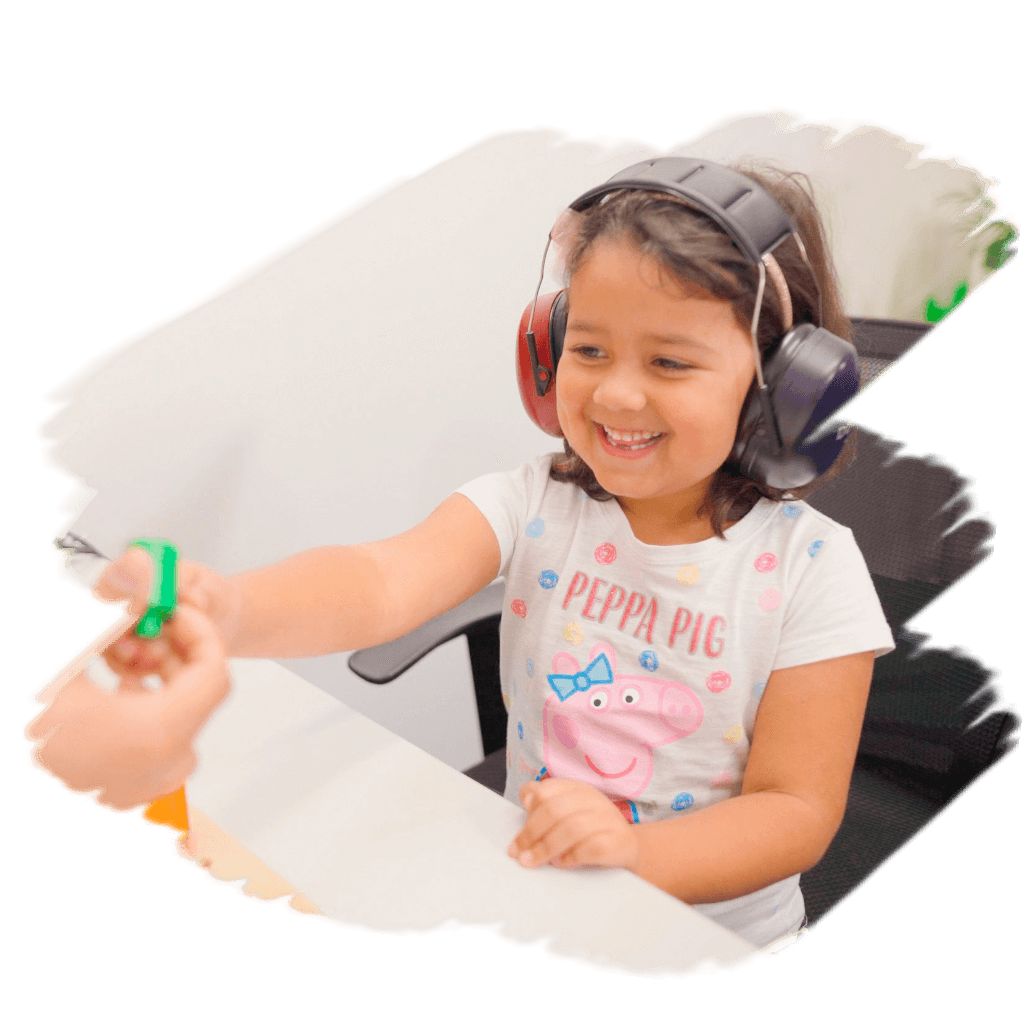 Child playing a game as part of Play Audiometry